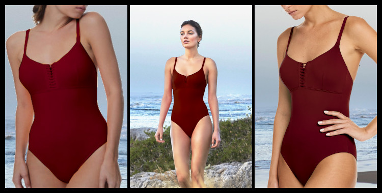 Maillots de bain une pièce de la marque Dnud, décolleté droit, bretelles réglables sur les épaules, en coloris rouge Grenade. Ce modèle permet un grand maintien pour les poitrines profondes. Photo prise sur fond de plage, de rocher, la mer et les vagues.