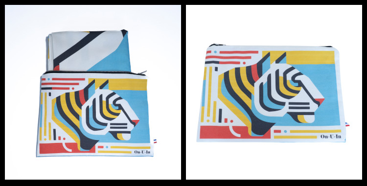 La pochette "Le Tigre à la plage" de la marque marseillaise On-U-In, fabriqué en France, 100% coton. Le thème Le Tigre à la plage évoque un félin stylisé. Photo prise des deux côtés de la pochette, recto verso.