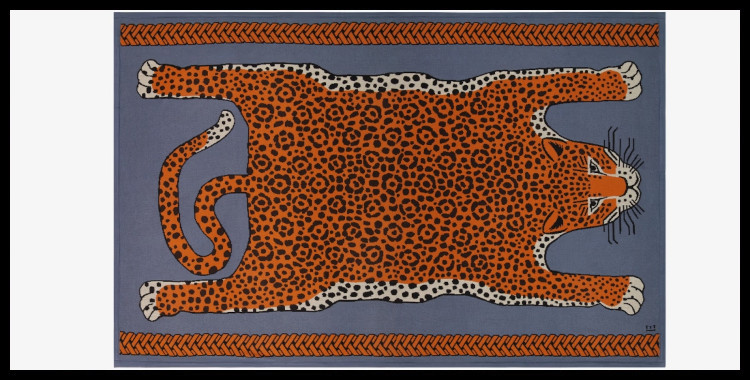 Plaid en coton Inoui Editions, la peau de léopard, en bleu et orange.