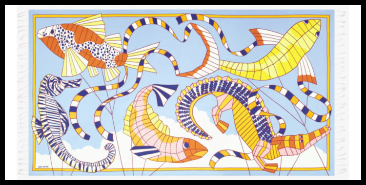 fouta inoui éditions, représente des cerfs-volants de poissons, en orange et bleu.