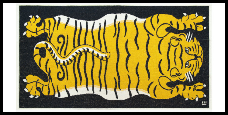 Serviette éponge, inoui éditions représente un tigre, en noir et jaune.
